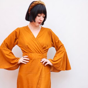 flare sleeve dress 70s 70s floaty blue and yellow floral maxi dress with flared sleeves. Approx UK size 14 main image 1