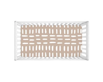 beige crib sheet