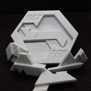 Hex Pak Two Layer Packing Puzzle image 1