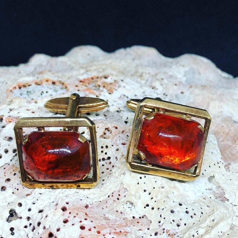 midcentury amber and gold tone cuff links. Vintage AMERIC signed