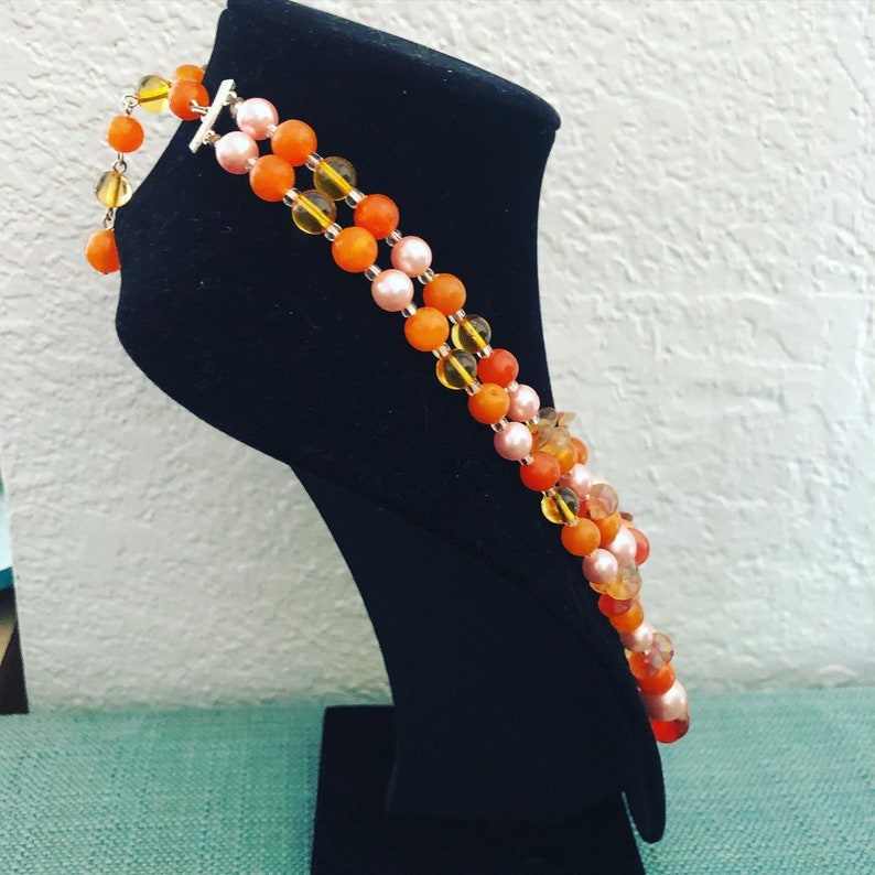 beaded necklace with beautiful oranges and pinks. double strand midcentury Vintage Japanese