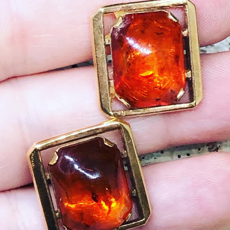 midcentury amber and gold tone cuff links. Vintage AMERIC signed