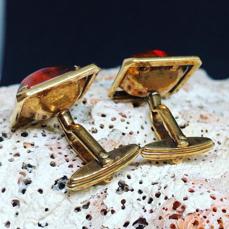 midcentury amber and gold tone cuff links. Vintage AMERIC signed