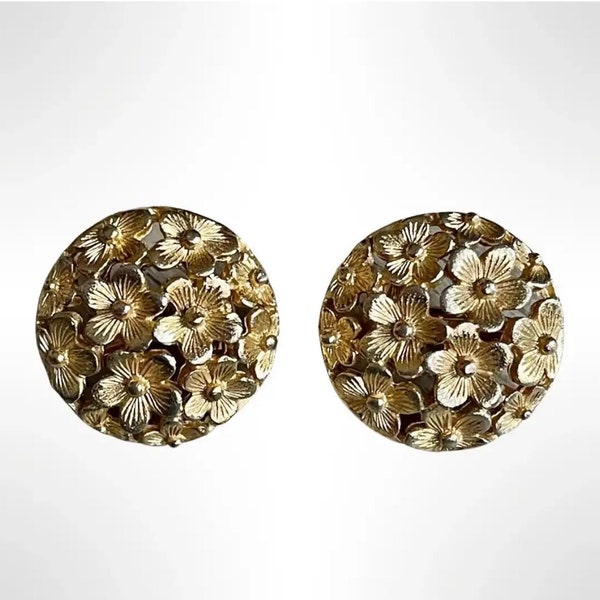 Daisy cluster cut out gold tone round button mid century vintage clip on earrings.