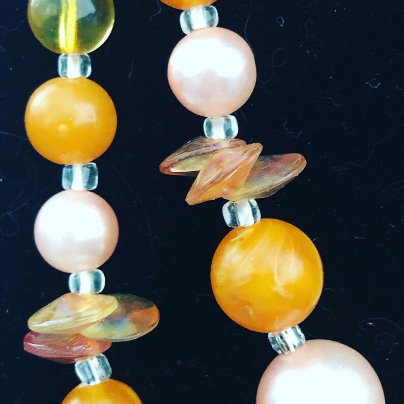 beaded necklace with beautiful oranges and pinks. double strand midcentury Vintage Japanese