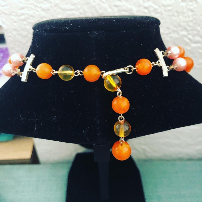 beaded necklace with beautiful oranges and pinks. double strand midcentury Vintage Japanese
