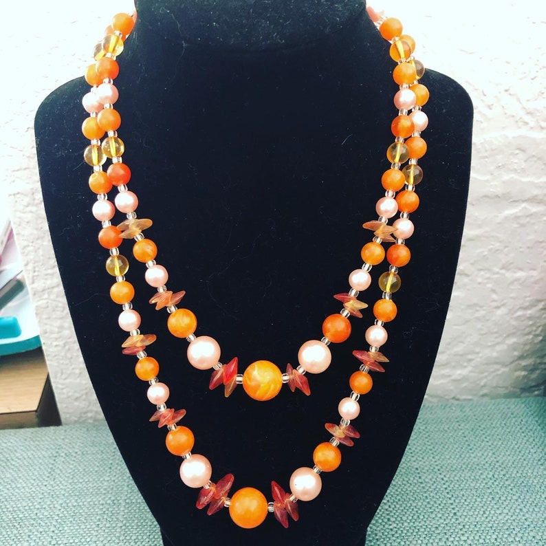 beaded necklace with beautiful oranges and pinks. double strand midcentury Vintage Japanese