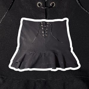 Black flared skirt with eyelet detail