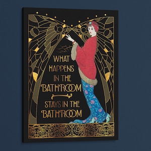 May include: A black and gold art print with a woman in a red and blue dress. The text reads "What happens in the bathroom stays in the bathroom."