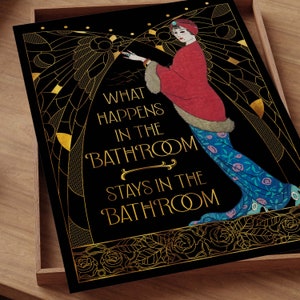 May include: A black and gold art print with a woman in a red and blue dress. The text reads "What happens in the bathroom stays in the bathroom."