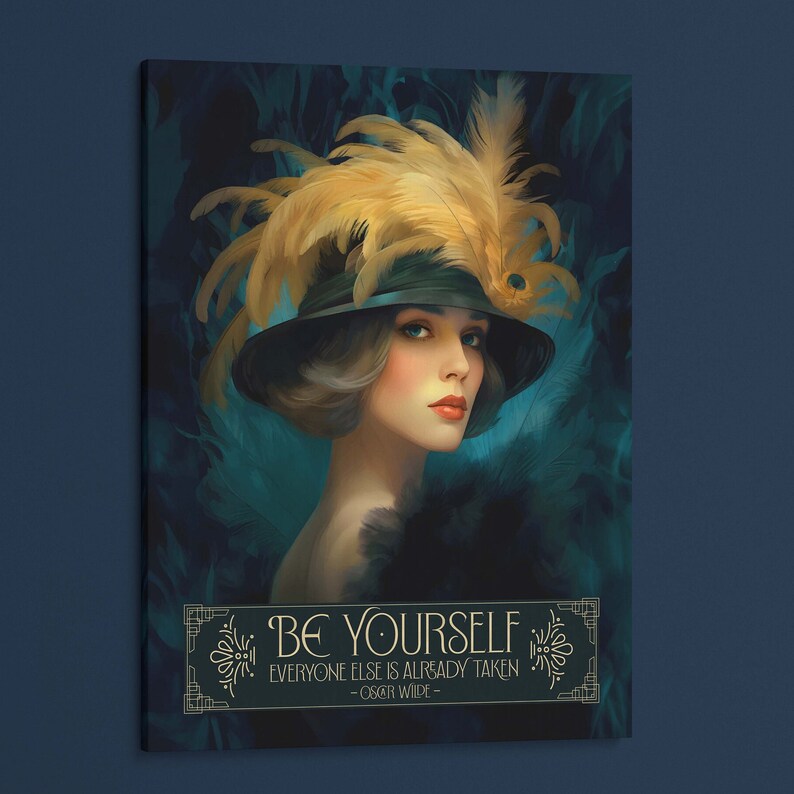 May include: A woman with blue eyes and red lips wears a black hat with a large yellow feather plume. The background is a dark teal with a quote in gold lettering: "Be yourself, everyone else is already taken - Oscar Wilde."