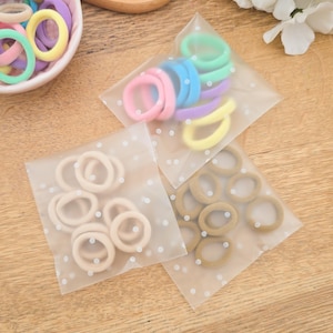 Pack of Baby Hair Ties, Baby Hair Bobbles, Toddler Hair Bands, Baby Hair Bands, Soft Hair Bobbles, Mini Hair Bands, Small Elastics - Qty 10.