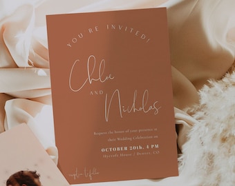 May include: A wedding invitation with a terracotta background and white text. The invitation reads "You're Invited" and features the names "Chloe and Nicholas". The invitation also includes the date and time of the wedding, "October 20th, 4 PM", and the location, "Mycroft House, Denver, CO".