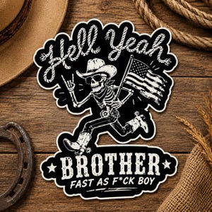 May include: A black and white sticker featuring a skeleton wearing a cowboy hat, sunglasses, and a bandana, making a rock-and-roll hand gesture while holding an American flag. The text reads Hell Yeah, BROTHER, and FAST AS F*CK BOY in bold lettering.