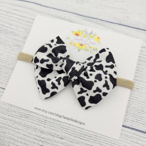 Cow Print Fabric Hair bow - hand tied bow - baby girl gift - baby headband - baby shower gift - baby toddler girl clip - cow birthday
