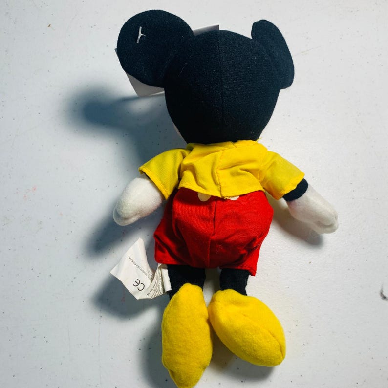 Peluche mini vintage de The Disney Store con forma de Espíritu de Mickey Mouse. imagen 2