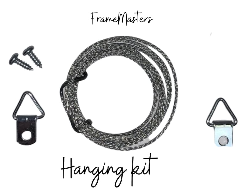 May include: A hanging kit for picture frames, including two D-rings, two screws, and a length of hanging wire. The kit is labeled "Frame Masters Hanging Kit".
