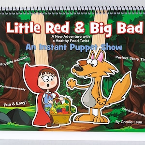 May include: A colorful book titled "Little Red & Big Bad: An Instant Puppet Show" with illustrations of Little Red Riding Hood and a wolf. The book includes puppets, is performance-ready, and features a healthy food twist.