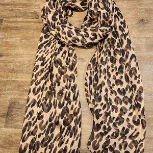 193cm x 65 cm / 76” x 25.60”  silk chiffon leopard print scarf.  100% silk chiffon scarf, soft &breathable silk scarf