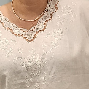 Vintage never been worn hand embroidered linen blouse with Venice lace. Short sleeve linen blouse, white, size M & L, in perfect condition