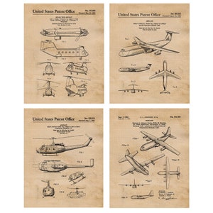 May include: A set of four vintage patent drawings for different types of aircraft. The drawings are in black and white and feature detailed illustrations of the aircraft. The drawings are on a beige background with a grid pattern.