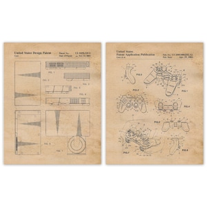 May include: Black and white line drawings of a video game console and controller. The drawings are on a beige background with the text "United States Design Patent" and "United States Patent Application Publication".