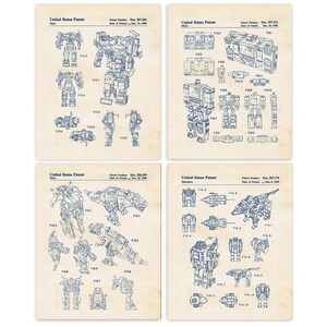 May include: A set of four blue and white blueprint style prints of Transformers robot toys. Each print features a different robot in both robot and vehicle mode. The prints are titled "United States Patent" and include the patent number and date.