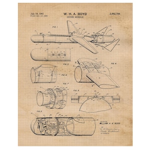 May include: A black and white technical drawing of a guided missile design patent. The patent is titled "W. H. A. BOYD GUIDED MISSILE" and the patent number is "2,992,794". The patent was filed on December 13, 1950 and issued on July 18, 1961.