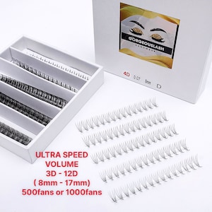 May include: A white box with black lash extensions in trays. The box is labeled "GORGEOUSLASH HANDMADE" and "4D 0.07 8mm D". The text "ULTRA SPEED VOLUME 3D-12D (8mm-17mm) 500fans or 1000fans" is printed on the box.
