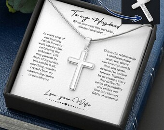 May include: A silver-toned cross pendant on a chain, presented in a black gift box with a message card. The card features the text To my Husband and a long sentiment. An inset image shows the back of the cross with the text Your Words Here.
