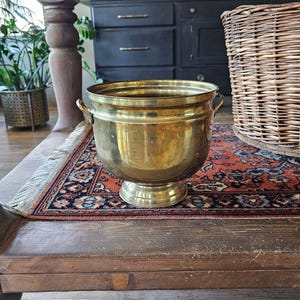 Vintage brass pedestal planter