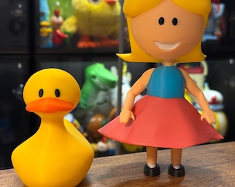 Juego de pato y muñeca de colección