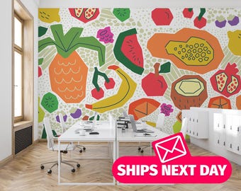 May include: A brightly coloured wall mural with an abstract design of fruits such as pineapple, banana, watermelon, and papaya. The artwork is set against a white background with a speckled pattern. The image also shows a modern office setting with white desks and chairs.