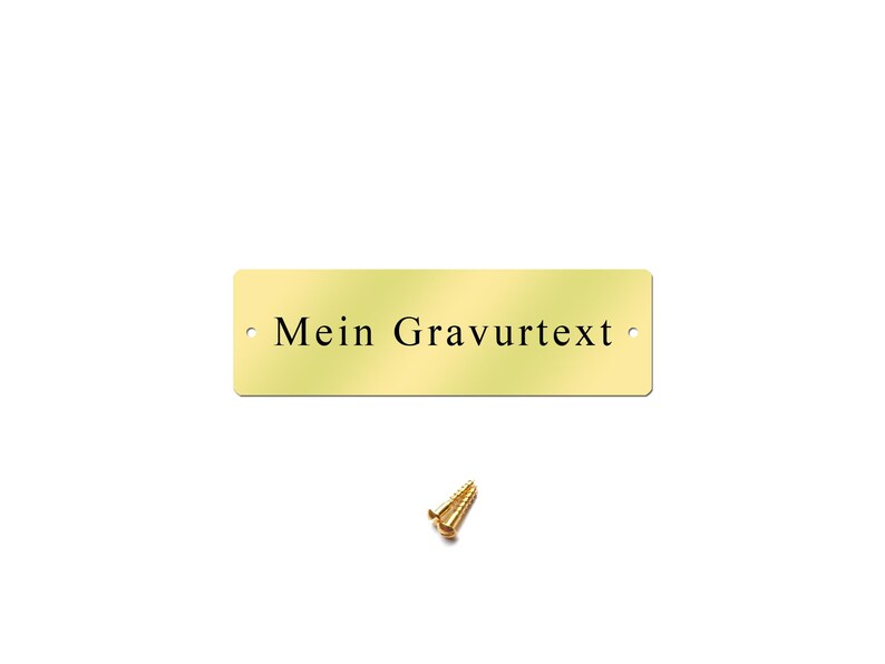 May include: A gold-colored metal plaque with rounded corners and two holes for hanging. The plaque has the text "Mein Gravurtext" engraved on it. A small gold screw is included.