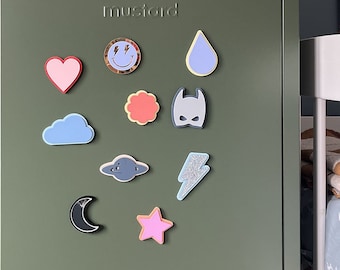 May include: A green metal locker with the word "mustard" printed on it. The locker has various colorful magnets attached to it, including a heart, a cloud, a star, a lightning bolt, a planet, a raindrop, a smiley face, a flower, a batman mask, and a crescent moon.