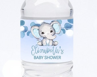 May include: A blue and white water bottle label with a cartoon elephant and the text "Elizabeth's Baby Shower".