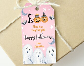 May include: A rectangular pink gift tag featuring watercolor illustrations of three white ghosts, two orange jack-o'-lanterns, bats, and crescent moons. The text reads: Boo, Here is a treat for you!, Happy Halloween, and Love, Samantha.