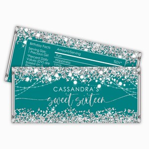 May include: Teal and silver glitter chocolate bar wrapper with the text "CASSANDRA'S sweet sixteen" and a nutrition facts label.
