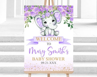 Puede incluir: Un cartel de bienvenida morado y dorado con un lindo elefante de dibujos animados que lleva una corona de flores. El cartel dice "Bienvenido a la Baby Shower de Mary Smith 09.21.XXXX".
