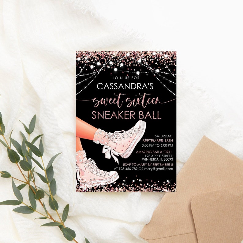 May include: A black and pink invitation with gold glitter for a sweet sixteen party. The invitation features a pair of pink sneakers with white laces and stars. The text on the invitation reads "Cassandra's Sweet Sixteen Sneaker Ball".