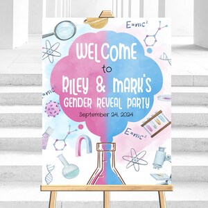 May include: A gender reveal party sign with a pink and blue watercolor background. The sign says "Welcome to Riley & Mark's Gender Reveal Party" and includes the date "September 24, 2024". The sign is decorated with science-themed illustrations, including beakers, atoms, and a microscope.