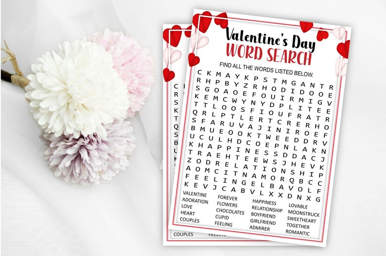 May include: A Valentine's Day word search puzzle with red hearts in the corners. The puzzle features a grid of letters with words related to love, romance, and Valentine's Day. Words to find include: Valentine, Adoration, Love, Heart, Couples, Forever, Flowers, Chocolates, Cupid, Feeling, Happiness, Relationship, Boyfriend, Girlfriend, Admirer, Lovable, Moonstruck, Sweetheart, Together, Romantic.