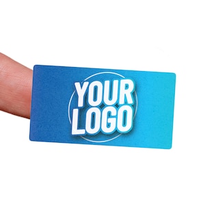 May include: A blue and white sticker with the text "YOUR LOGO" in a circle.