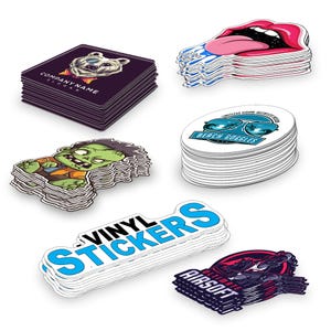 May include: Stacks of various vinyl stickers with different designs.  The stickers include a cartoon zombie, a polar bear, a mouth with a tongue sticking out, a beach goggle design, a text sticker that says "Vinyl Stickers", and a sticker with a soldier and the text "Ultimate Airsoft".