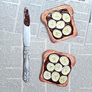Imagen de tostada de plátano Arte de periódico Decoración de pared en 3D Postre de plátanos Pintura de comida Arte del desayuno Imagen con textura Imagen de tostada con Nutella