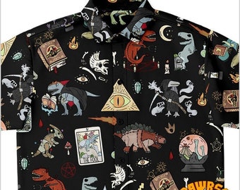May include: A black short-sleeved button-up shirt with a repeating pattern of dinosaurs, skulls, bones, and other occult imagery. The shirt has a white button-up collar and the text "BOOK OF THEX" appears multiple times on the shirt. The shirt also features the text "BE RAWRSOME" with a green dinosaur illustration.