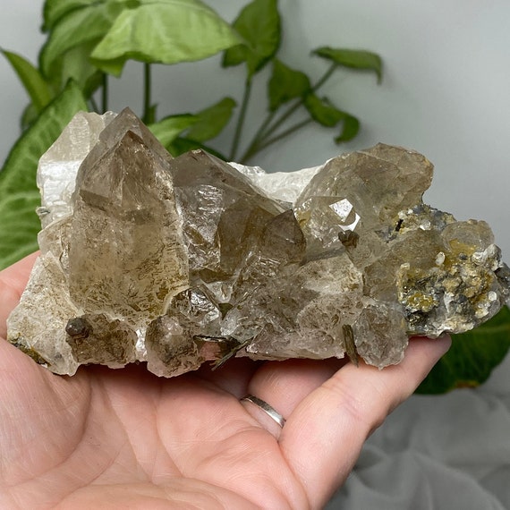 Quartz Cluster with Pyrite Inclusions and Calcite and Chalcopyrite