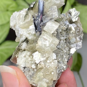 Siderite and Mica with Calcite and Rutile