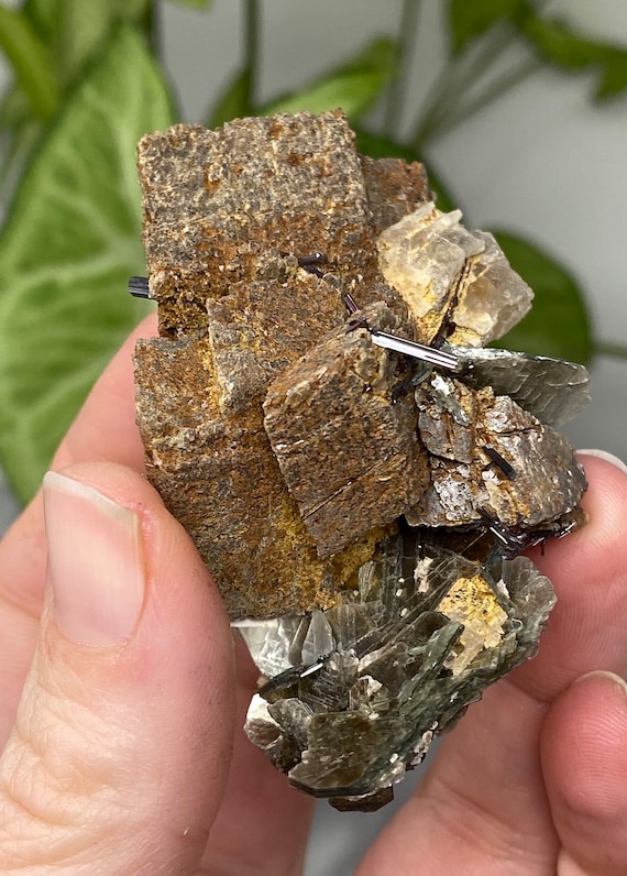 Siderite into Limonite With Calcite, Mica, and Red Rutile