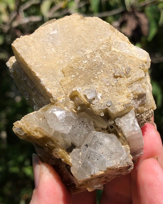 Sidderite with Calcite, Mica and Pyrite